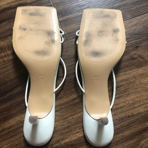 White kitten heels by Mango.